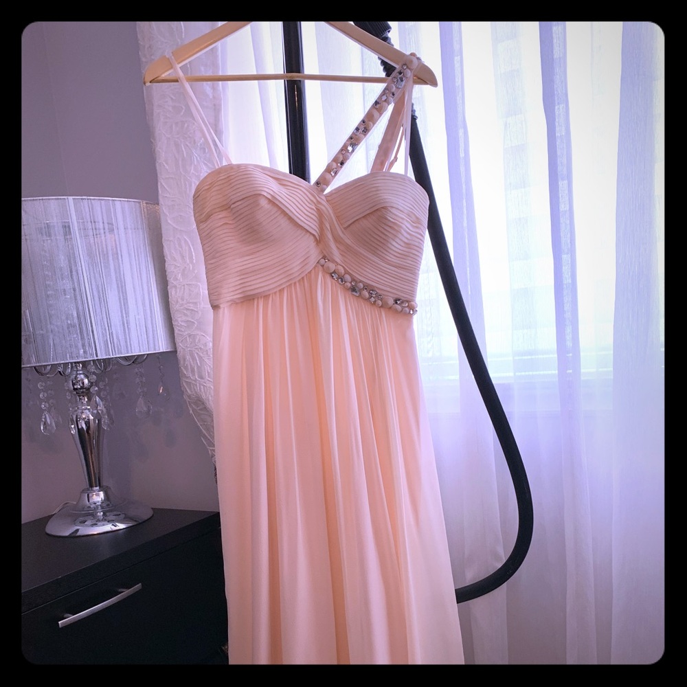 BCBG Maxazria Women’s long semi-strapless dress.